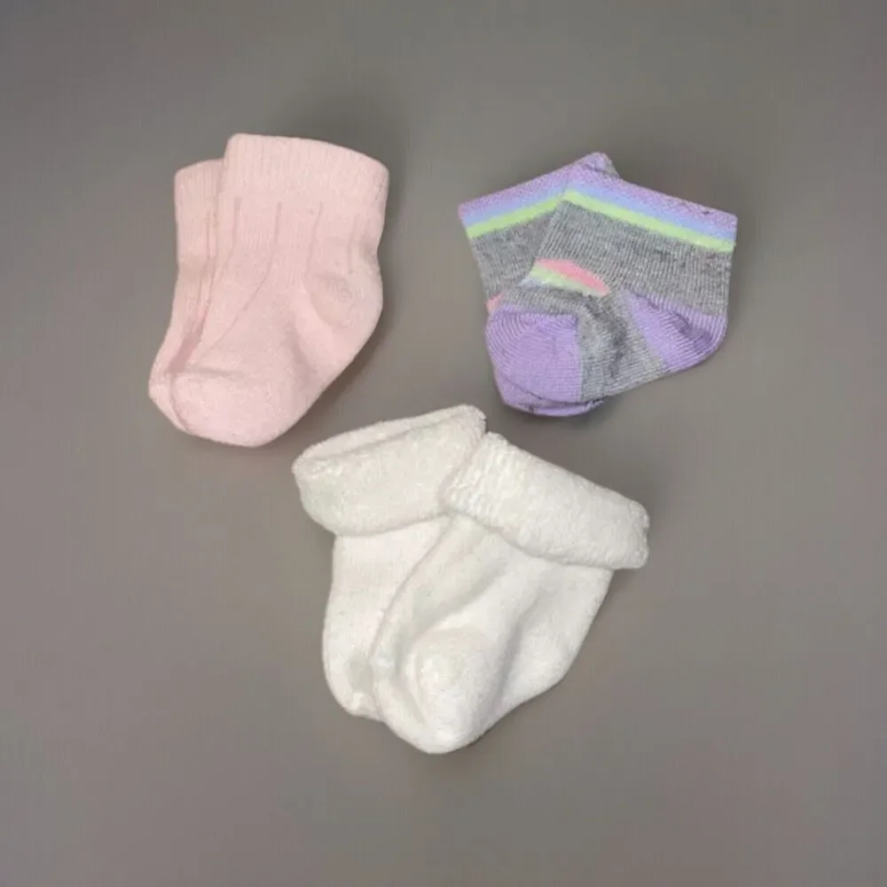 Lot Of Four Baby Girl Bibs And Three Pair Of Little Socks Mixed Brands